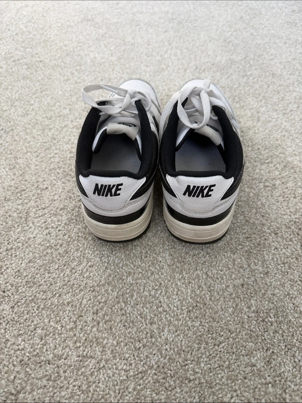 Nike White and Black Low-Top Sneakers with Swoosh